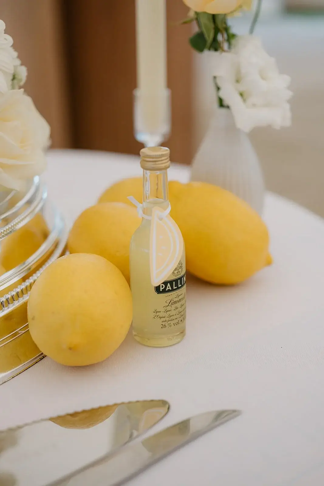 Illustrated antipasti menu and limoncello favours on the feasting table
