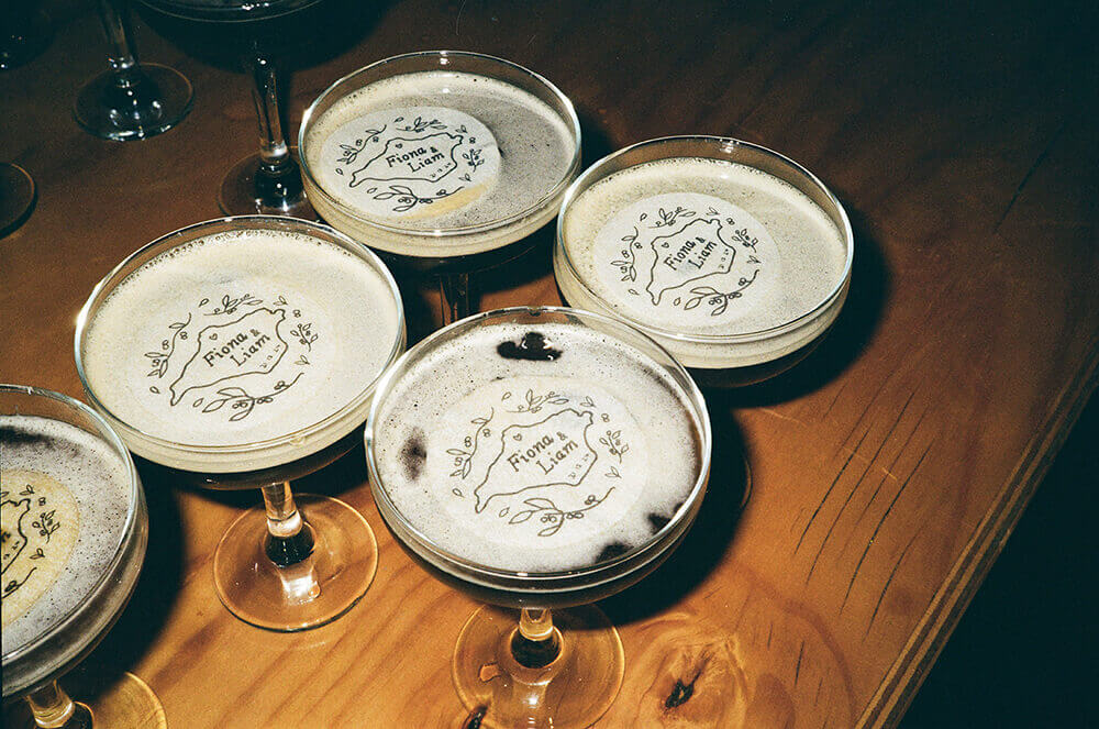 Espresso martinis topped with a custom Fiona and Liam crest stencilled in the foam