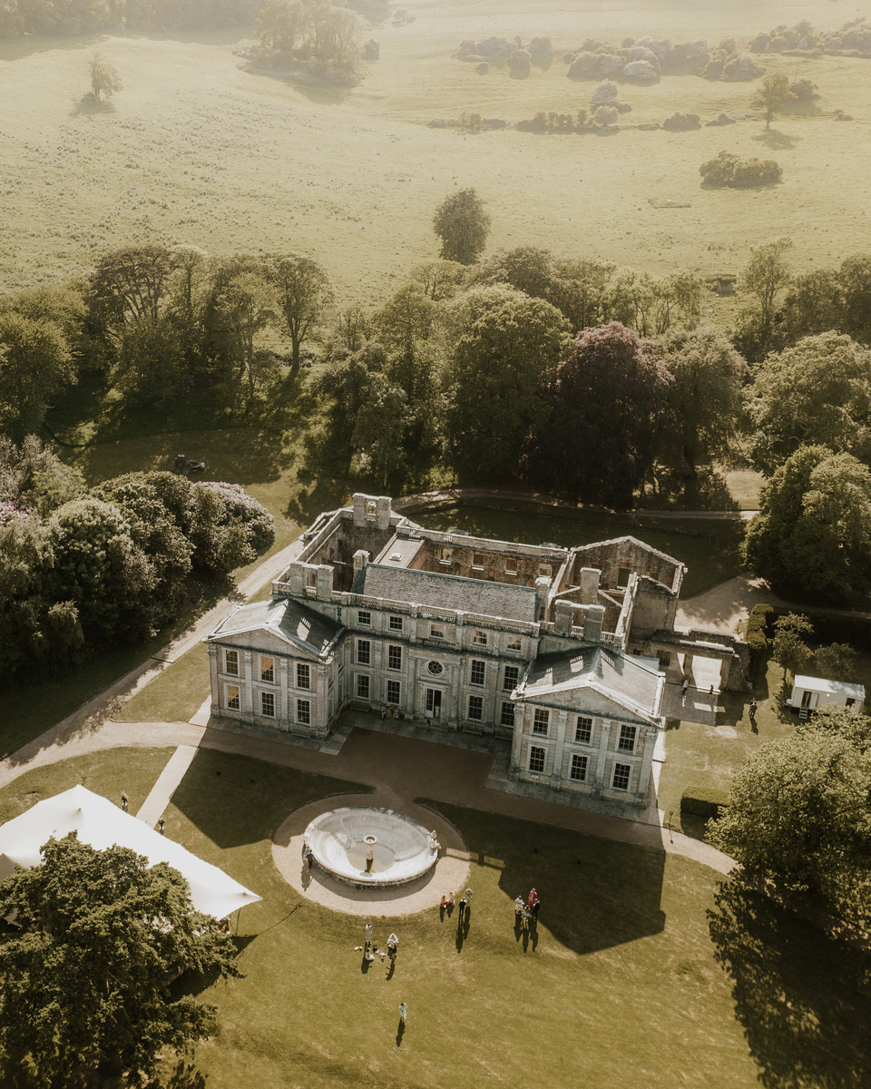 Aerial view of Appuldurcombe House and its surrounding parkland and marquee setup
