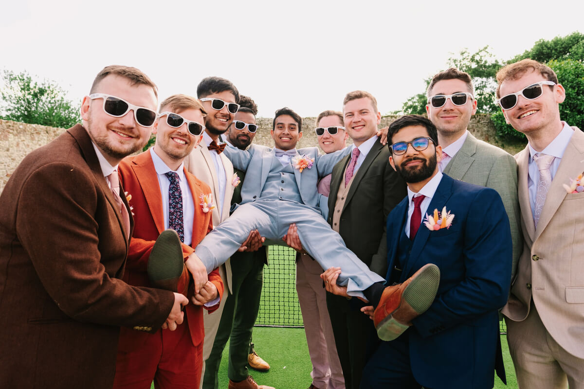 Groomsmen in sunglasses at Barton Manor