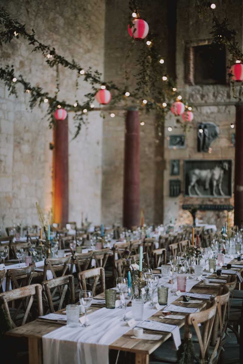 Rebecca & Russel's Italian-inspired candlelit reception within the stone walls of Appuldurcombe House